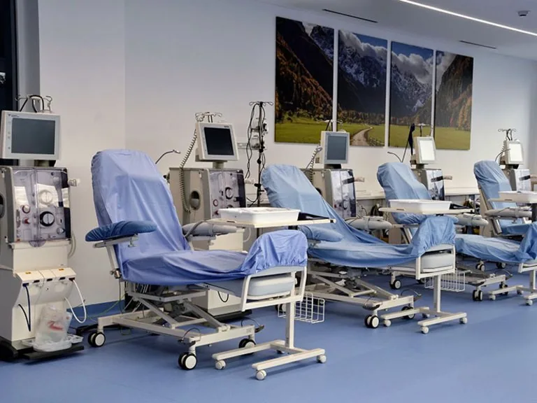A hospital treatment ward with dialysis machines and medical equipment