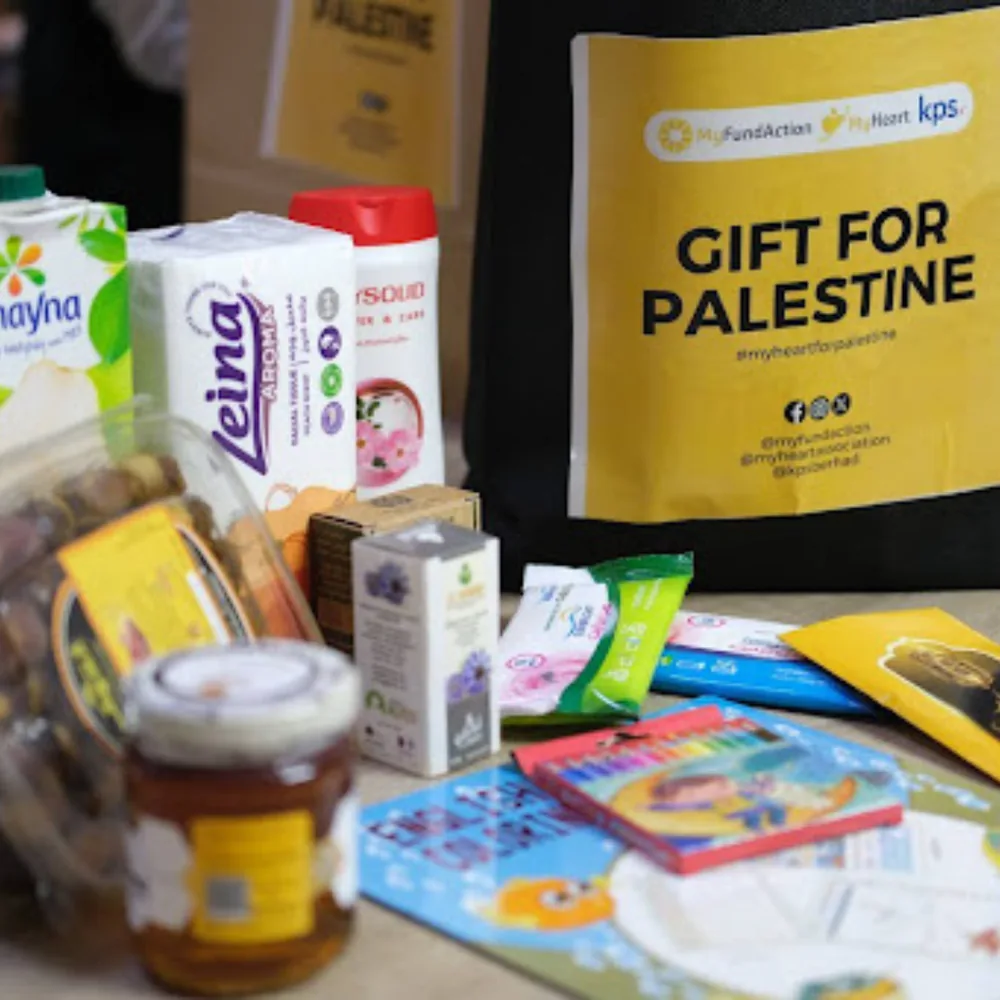 A MyFundAction 'Gift for Palestine' recovery pack — honey, dates, black seed and comfort items